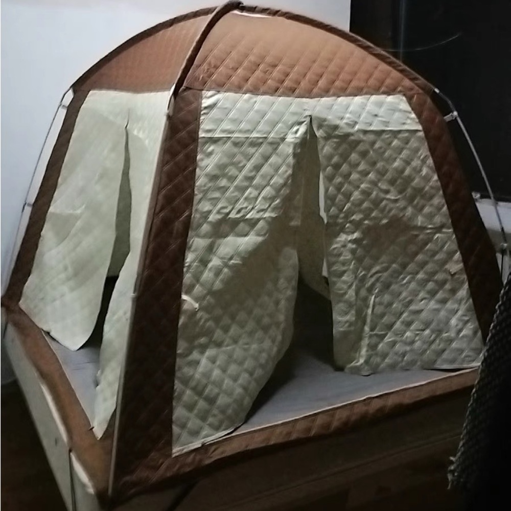 Warm tent on the bed